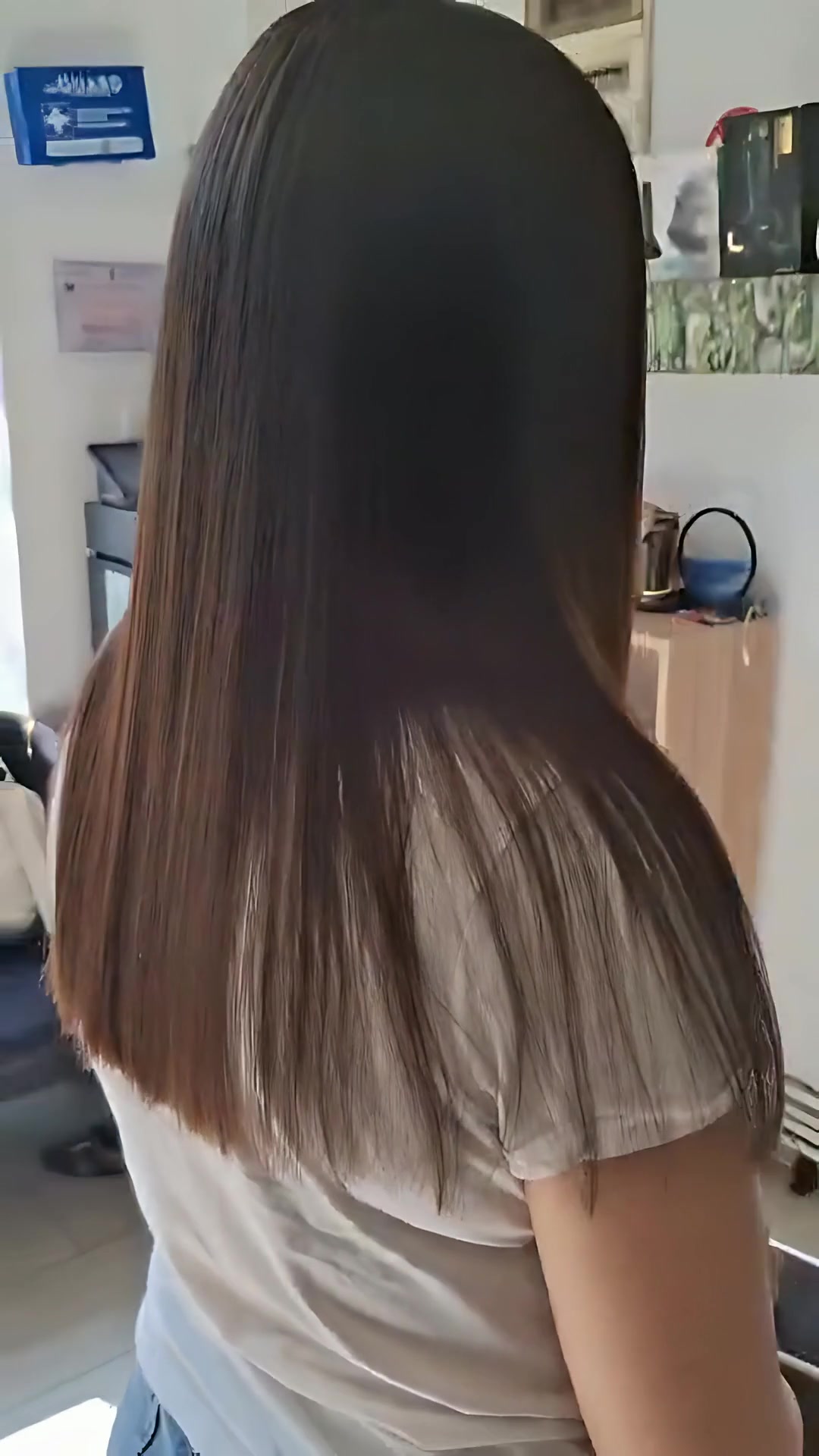 Long-hair cut, followed by washing and styling.